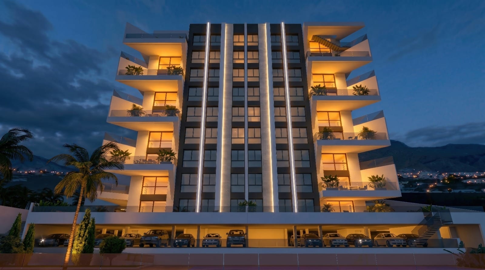 Project visualisation of the planned SAVO residence on the Costa Blanca: a lit tower at dusk above the sea and the hills