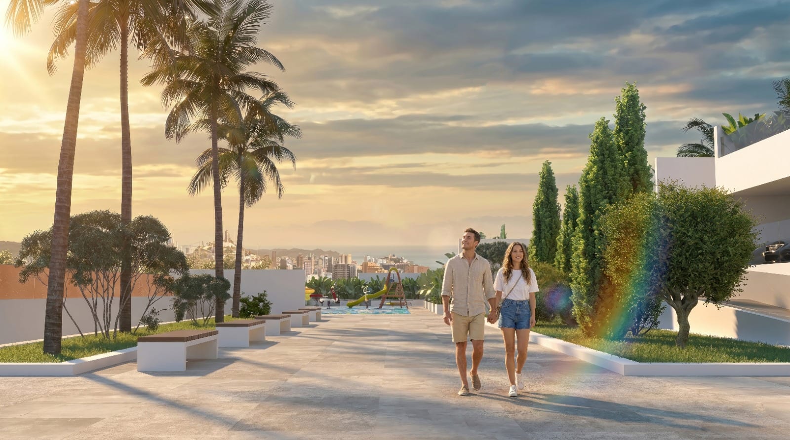 Villajoyosa Residence, project visualisation: a couple walking along the planned pool deck between palms at sunset