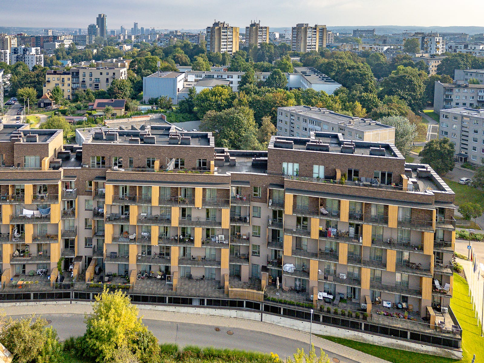 Lucky Homes by SAVO from the air, with the residential districts of Vilnius and the towers of the business centre on the horizon